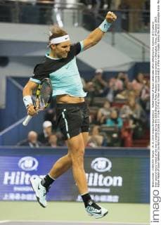 Rafael Nadal of Spain celebrates after defeating Ivo Karlovic of Croatia in their second round match of the men s singles during the 2015 Shanghai Rolex Masters tennis tournament in Shanghai, China, 14 October 2015. Rafael Nadal of Spain defeated Ivo Karlovic of Croatia 2-1 (7-5 6-7 7-6) in their second round match of the men s singles during the 2015 Shanghai Rolex Masters tennis tournament in Shanghai, China, 14 October 2015. Rafael Nadal defeats Ivo Karlovic at Shanghai Rolex Masters  20151014_51613
