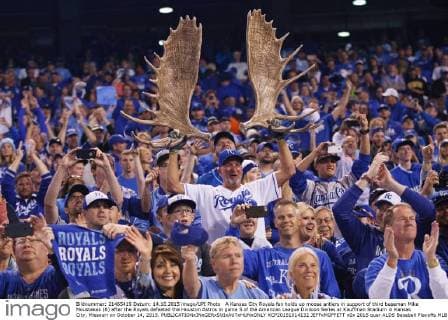 A Kansas City Royals fan holds up moose antlers in support of third baseman Mike Moustakas (8) after the Royals defeated the Houston Astros in game 5 of the American League Division Series at Kauffman Stadium in Kansas City, Missouri on October 14, 2015.  KCP20151014132 JEFFxMOFFETT