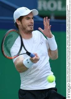 SHANGHAI, CHINA - OCTOBER 15: (CHINA OUT) Andy Murray of Great Britain returns a shot to John Isner of the USA in their men s singles third round match on day 5 of 2015 Shanghai Rolex Masters at the Shanghai Masters tennis tournament on October 15, 2015 in Shanghai, China.  CFP474376017 
