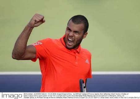 Jo-Wilfried Tsonga of France reacts after defeating Albert Ramos-Vinolas of Spain in their third round match of the men s singles during the 2015 Shanghai Rolex Masters tennis tournament in Shanghai, China, 15 October 2015. Jo-Wilfried Tsonga of France defeated Albert Ramos-Vinolas of Spain 2-1 (6-7 7-5 6-4) in their third round match of the men s singles during the 2015 Shanghai Rolex Masters tennis tournament in Shanghai, China, 15 October 2015. Jo-Wilfried Tsonga defeats Albert Ramos-Vinolas at Shanghai Rolex Masters  pbu345678_14