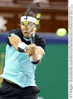(151015) -- SHANGHAI, Oct. 15, 2015 -- Rafael Nadal of Spain hits a return to Milos Raonic of Canada during their men s singles match at the Shanghai Masters tennis tournament in Shanghai, east China, on Oct. 15, 2015. ) (SP)CHINA-SHANGHAI-TENNIS-SHANGHAI MASTERS (CN) FanxJun 