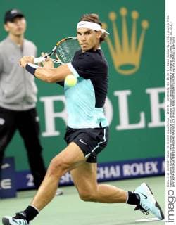 (151015) -- SHANGHAI, Oct. 15, 2015 -- Rafael Nadal of Spain hits a return to Milos Raonic of Canada during their men s singles match at the Shanghai Masters tennis tournament in Shanghai, east China, on Oct. 15, 2015. ) (SP)CHINA-SHANGHAI-TENNIS-SHANGHAI MASTERS (CN) FanxJun 
