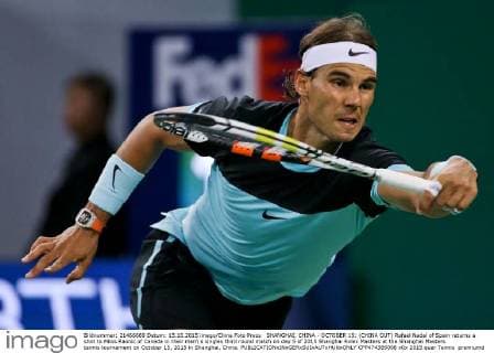 SHANGHAI, CHINA - OCTOBER 15: (CHINA OUT) Rafael Nadal of Spain returns a shot to Milos Raonic of Canada in their men s singles third round match on day 5 of 2015 Shanghai Rolex Masters at the Shanghai Masters tennis tournament on October 15, 2015 in Shanghai, China.  CFP474385098 
