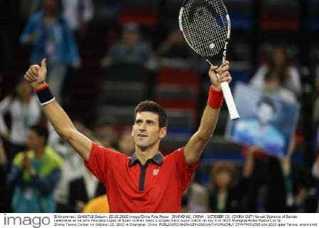 SHANGHAI, CHINA - OCTOBER 15: (CHINA OUT) Novak Djokovic of Serbia celebrates as he wins Feliciano Lopez of Spain in their men s singles third round match on day 5 of 2015 Shanghai Rolex Masters at Qi Zhong Tennis Center on October 15, 2015 in Shanghai, China.  CFP474382090 