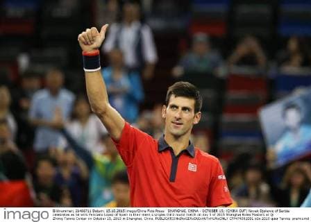 SHANGHAI, CHINA - OCTOBER 15: (CHINA OUT) Novak Djokovic of Serbia celebrates as he wins Feliciano Lopez of Spain in their men s singles third round match on day 5 of 2015 Shanghai Rolex Masters at Qi Zhong Tennis Center on October 15, 2015 in Shanghai, China.  CFP474382091 