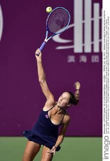 (151016) -- TIANJIN, Oct. 16, 2015 -- Bojana Jovanovski of Serbia serves during the women s singles quarterfinal match against Kristina Mladenovic of France at the Tianjin Open tennis tournament in Tianjin, north China, Oct. 16, 2015. Jovanovski won 2-1. ) (SP)CHINA-TIANJIN-TENNIS YuexYuewei 
