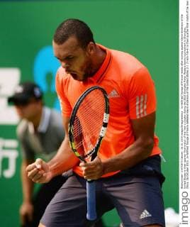 Jo-Wilfried Tsonga of France reacts after scoring against Kevin Anderson of the United States in their quarter-final match of the men s singles during the 2015 Shanghai Rolex Masters tennis tournament in Shanghai, China, 16 October 2015. Jo-Wilfried Tsonga of France defeated Kevin Anderson of the United States 2-1 (7-6 5-7 6-4) in their quarter-final match of the men s singles during the 2015 Shanghai Rolex Masters tennis tournament in Shanghai, China, 16 October 2015. Jo-Wilfried Tsonga eliminates Kevin Anderson at Shanghai Rolex Masters  20151016_32259