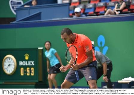 Jo-Wilfried Tsonga of France reacts after scoring against Kevin Anderson of the United States in their quarter-final match of the men s singles during the 2015 Shanghai Rolex Masters tennis tournament in Shanghai, China, 16 October 2015. Jo-Wilfried Tsonga of France defeated Kevin Anderson of the United States 2-1 (7-6 5-7 6-4) in their quarter-final match of the men s singles during the 2015 Shanghai Rolex Masters tennis tournament in Shanghai, China, 16 October 2015. Jo-Wilfried Tsonga eliminates Kevin Anderson at Shanghai Rolex Masters  20151016_63692