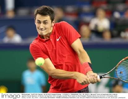 (151016) -- SHANGHAI, Oct. 16, 2015 -- Bernard Tomic of Australia hits a return against Novak Djokovic of Serbia during their men s singles quarter-final match at the Shanghai Masters tennis tournament in Shanghai, east China, on Oct. 16, 2015. ) (SP)CHINA-SHANGHAI-TENNIS-SHANGHAI MASTERS (CN) FanxJun 