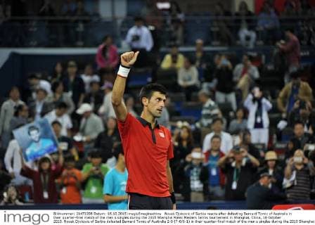 Novak Djokovic of Serbia reacts after defeating Bernard Tomic of Australia in their quarter-final match of the men s singles during the 2015 Shanghai Rolex Masters tennis tournament in Shanghai, China, 16 October 2015. Novak Djokovic of Serbia defeated Bernard Tomic of Australia 2-0 (7-6 6-1) in their quarter-final match of the men s singles during the 2015 Shanghai Rolex Masters tennis tournament in Shanghai, China, 16 October 2015. Novak Djokovic kicks out Bernard Tomic to advance to semi-final at Shanghai Rolex Masters  pbu346293_01