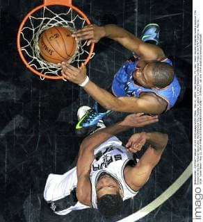 May 21, 2014 - San Antonio, TX, USA - Kevin Durant Smashes home a dunk on Tim Duncan as the San Antonio Spurs play the Oklahoma City Thunder in game 2 of the Western Conference Finals at the AT&T Center on May 21, 2014. Texas News - May 21, 2014 - ZUMAa27_