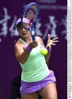 (151017) -- TIANJIN , Oct. 17, 2015 -- Danka Kovinic of Montenegro returns the ball against Bojana Jovanovski of Serbia during their singles semifinal of 2015 Tianjin Open Tennis Tournament at Tianjin Tuanbo International Tennis Center in Tianjin, China on Oct. 17, 2015. Danka Kovinic won 2-1.) (wll) (SP)CHINA-TIANJIN-TENNIS-TIANJIN OPEN-SINGLES-SEMIFINAL(CN) YuexYuewei 
