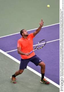 Jo-Wilfried Tsonga of France serves against Rafael Nadal of Spain in their semi-final match of the men s singles during the 2015 Shanghai Rolex Masters tennis tournament in Shanghai, China, 17 October 2015. Jo-Wilfried Tsonga competes with Rafael Nadal of Spain in semi-final at Shanghai Rolex Masters  20151017_31584
