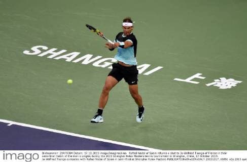 Rafael Nadal of Spain returns a shot to Jo-Wilfried Tsonga of France in their semi-final match of the men s singles during the 2015 Shanghai Rolex Masters tennis tournament in Shanghai, China, 17 October 2015. Jo-Wilfried Tsonga competes with Rafael Nadal of Spain in semi-final at Shanghai Rolex Masters  20151017_08851