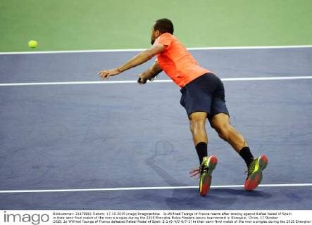 Jo-Wilfried Tsonga of France reacts after scoring against Rafael Nadal of Spain in their semi-final match of the men s singles during the 2015 Shanghai Rolex Masters tennis tournament in Shanghai, China, 17 October 2015. Jo-Wilfried Tsonga of France defeated Rafael Nadal of Spain 2-1 (6-4 0-6 7-5) in their semi-final match of the men s singles during the 2015 Shanghai Rolex Masters tennis tournament in Shanghai, China, 17 October 2015. Jo-Wilfried Tsonga ousts Rafael Nadal to advance to final at Shanghai Rolex Masters  20151017_63549