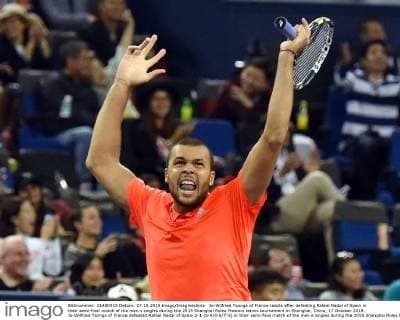 Jo-Wilfried Tsonga of France reacts after defeating Rafael Nadal of Spain in their semi-final match of the men s singles during the 2015 Shanghai Rolex Masters tennis tournament in Shanghai, China, 17 October 2015. Jo-Wilfried Tsonga of France defeated Rafael Nadal of Spain 2-1 (6-4 0-6 7-5) in their semi-final match of the men s singles during the 2015 Shanghai Rolex Masters tennis tournament in Shanghai, China, 17 October 2015. Jo-Wilfried Tsonga ousts Rafael Nadal to advance to final at Shanghai Rolex Masters  20151017_49412