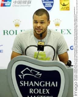 Jo-Wilfried Tsonga of France smiles at a press conference PK Pressekonferenz after defeating Rafael Nadal of Spain in their semi-final match of the men s singles during the 2015 Shanghai Rolex Masters tennis tournament in Shanghai, China, 17 October 2015. Jo-Wilfried Tsonga of France defeated Rafael Nadal of Spain 2-1 (6-4 0-6 7-5) in their semi-final match of the men s singles during the 2015 Shanghai Rolex Masters tennis tournament in Shanghai, China, 17 October 2015. Jo-Wilfried Tsonga feels happy during press conference at Shanghai Rolex Masters  20151017_32558