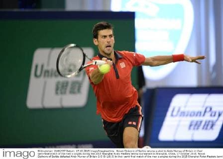 Novak Djokovic of Serbia returns a shot to Andy Murray of Britain in their semi-final match of the men s singles during the 2015 Shanghai Rolex Masters tennis tournament in Shanghai, China, 17 October 2015. Novak Djokovic of Serbia defeated Andy Murray of Britain 2-0 (6-1 6-3) in their semi-final match of the men s singles during the 2015 Shanghai Rolex Masters tennis tournament in Shanghai, China, 17 October 2015. Novak Djokovic eliminates Andy Murray to advance to final at Shanghai Rolex Masters  20151017_10762