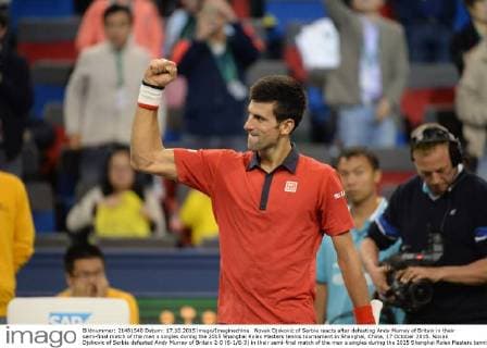 Novak Djokovic of Serbia reacts after defeating Andy Murray of Britain in their semi-final match of the men s singles during the 2015 Shanghai Rolex Masters tennis tournament in Shanghai, China, 17 October 2015. Novak Djokovic of Serbia defeated Andy Murray of Britain 2-0 (6-1 6-3) in their semi-final match of the men s singles during the 2015 Shanghai Rolex Masters tennis tournament in Shanghai, China, 17 October 2015. Novak Djokovic eliminates Andy Murray to advance to final at Shanghai Rolex Masters  20151017_10774