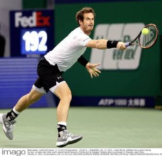 (151017) -- SHANGHAI, Oct. 17, 2015 -- Andy Murray of Britain hits a return during his men s singles semi-final match against Novak Djokovic of Serbia at the Shanghai Masters tennis tournament in Shanghai, east China, October 17, 2015. Novak Djokovic won 2-0.Fan Jun) (SP)CHINA-SHANGHAI-TENNIS-SHANGHAI MASTERS (CN) fanjun 