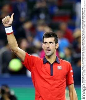 (151017) -- SHANGHAI, Oct. 17, 2015 -- Novak Djokovic of Serbia celebrates after winning his men s singles semi-final match against Andy Murray of Britain at the Shanghai Masters tennis tournament in Shanghai, east China, October 17, 2015. Novak Djokovic won 2-0.Fan Jun) (SP)CHINA-SHANGHAI-TENNIS-SHANGHAI MASTERS (CN) fanjun 