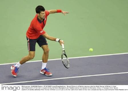 Novak Djokovic of Serbia returns a shot to Andy Murray of Britain in their semi-final match of the men s singles during the 2015 Shanghai Rolex Masters tennis tournament in Shanghai, China, 17 October 2015. Novak Djokovic of Serbia defeated Andy Murray of Britain 2-0 (6-1 6-3) in their semi-final match of the men s singles during the 2015 Shanghai Rolex Masters tennis tournament in Shanghai, China, 17 October 2015. Novak Djokovic eliminates Andy Murray to advance to final at Shanghai Rolex Masters  20151017_65323
