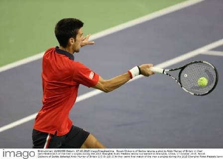 Novak Djokovic of Serbia returns a shot to Andy Murray of Britain in their semi-final match of the men s singles during the 2015 Shanghai Rolex Masters tennis tournament in Shanghai, China, 17 October 2015. Novak Djokovic of Serbia defeated Andy Murray of Britain 2-0 (6-1 6-3) in their semi-final match of the men s singles during the 2015 Shanghai Rolex Masters tennis tournament in Shanghai, China, 17 October 2015. Novak Djokovic eliminates Andy Murray to advance to final at Shanghai Rolex Masters  20151017_65329
