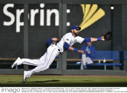 Oct. 17, 2015 - Kansas City, MO, USA - Kansas City Royals right fielder Alex Rios dives for an RBI double by the Toronto Blue Jays Troy Tulowitzki in the sixth inning during Game 2 of the ALCS on at Kauffman Stadium in Kansas City, Mo., on Saturday, Oct. 17, 2015. Toronto at Kansas City, ALCS Game 2 - ZUMAm67_