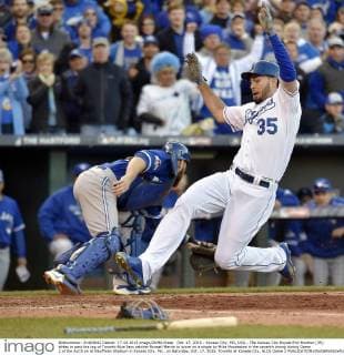 Oct. 17, 2015 - Kansas City, MO, USA - The Kansas City Royals Eric Hosmer (35) slides in past the tag of Toronto Blue Jays catcher Russell Martin to score on a single by Mike Moustakas in the seventh inning during Game 2 of the ALCS on at Kauffman Stadium in Kansas City, Mo., on Saturday, Oct. 17, 2015. Toronto at Kansas City, ALCS Game 2 - ZUMAm67_