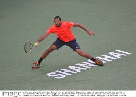 Jo-Wilfried Tsonga of France returns a shot to Novak Djokovic of Serbia in their final match of the men s singles during the 2015 Shanghai Rolex Masters tennis tournament in Shanghai, China, 18 October 2015. Novak Djokovic competes against Jo-Wilfried Tsonga at Shanghai Rolex Masters  pbu346987_04