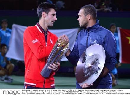 Oct. 18, 2015 - Shanghai, People s Republic of China - NOVAK DJOKOVIC of Serbia poses for photos with his trophy after win the match against JO WILFRIED TSONGA of France, during the final of the Shanghai Rolex Masters Tennis Tournament, Djokovic won Tsonga 2 - 0. Tennis 2015 - Shanghai Masters  - ZUMAm119