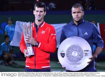 Oct. 18, 2015 - Shanghai, People s Republic of China - NOVAK DJOKOVIC of Serbia poses for photos with his trophy after win the match against JO WILFRIED TSONGA of France, during the final of the Shanghai Rolex Masters Tennis Tournament, Djokovic won Tsonga 2 - 0. Tennis 2015 - Shanghai Masters  - ZUMAm119