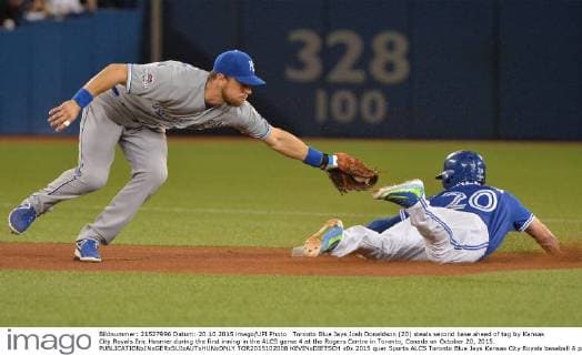 Toronto Blue Jays Josh Donaldson (20) steals second base ahead of tag by Kansas City Royals Eric Hosmer during the first inning in the ALCS game 4 at the Rogers Centre in Toronto, Canada on October 20, 2015.  TOR2015102008 KEVINxDIETSCH