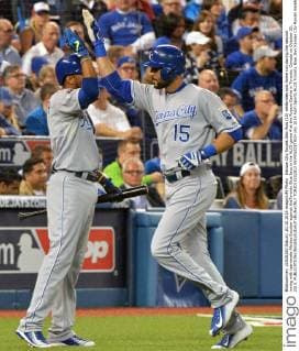 Kansas City Royals Alex Rios (15) celebrates solo home run during the second inning with teammate Alcides Escobar against theToronto Blue Jays in the ALCS game 4 at the Rogers Centre in Toronto, Canada on October 20, 2015.  TOR2015102012 KEVINxDIETSCH