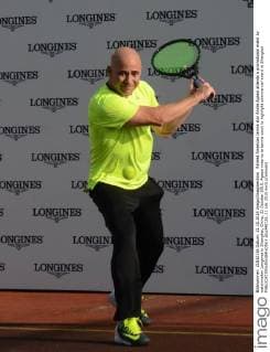 Retired American tennis star Andre Agassi attends a promotional event by watchmaker Longines in Shanghai, China, 21 October 2015. Agassi returns to tennis court to highlight commercial event in Shanghai  pbu348725_11