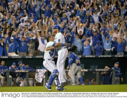 Kansas City Royals pitcher Wade Davis (R) leaps into the arms of catcher Salvador Perez after winning the ALCS game 6 at Kaufman Stadium in Kansas City on October 23, 2015. Kansas City beats Toronto 4-3 to win the 2015 ALCS.  KCP2015102368 KEVINxDIETSCH