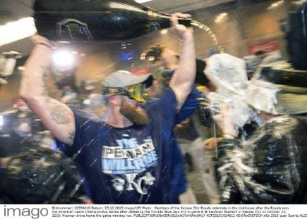 Members of the Kansas City Royals celebrate in the clubhouse after the Royals won the American Leave Championship Series after defeating the Toronto Blue Jays 4-3 in game 6 at Kaufman Stadium in Kansas City on October 23, 2015. Hosmer drove home the game winning run.  KCP20151024812 KEVINxDIETSCH