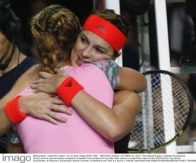 MOSCOW, RUSSIA. OCTOBER 24, 2015. First-placed Russia s Svetlana Kuznetsova (front) and her second-placed compatriot Anastasia Pavlyuchenkova hug after their women s single final match at the 2015 Kremlin Cup tennis tournament, at Moscow s Olympiysky Sports Complex. Kuznetsova won with 6-2 and 6-1. Mikhail Japaridze TASS  TS010822