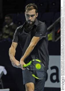 25.10.2015. Basel, Switzerland. Basel Swiss Indoor Tennis Championships. Day One. Jerzy Janowicz in action in the match between Mikhail Youzhny of Russia and Jerzy Janowicz of Poland xDavidxEmmx  ActionPlus11675822
