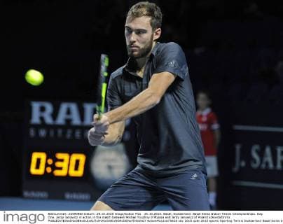 25.10.2015. Basel, Switzerland. Basel Swiss Indoor Tennis Championships. Day One. Jerzy Janowicz in action in the match between Mikhail Youzhny of Russia and Jerzy Janowicz of Poland xDavidxEmmx  ActionPlus11675823