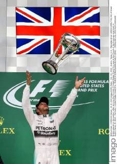Oct. 25, 2015 - Austin, Texas, U.S - Mercedes driver LEWIS HAMILTON (44) of Great Britain stands on the podium after winning the Formula 1 United States Grand Prix race at the Circuit of the Americas race track in Austin,Texas. F1 2015 - Formula 1 United States Grand Prix. - ZUMAw300
