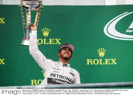 Oct. 25, 2015 - Austin, Texas, U.S - Mercedes driver LEWIS HAMILTON (44) of Great Britain stands on the podium after winning the Formula 1 United States Grand Prix race at the Circuit of the Americas race track in Austin,Texas. F1 2015 - Formula 1 United States Grand Prix. - ZUMAw300