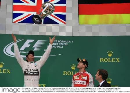 25.10.2015. Circuit of the Americas, Austin, Texas, USA. The delayed race after qualifying was held early Sunday. Mercedes AMG Petronas F1 driver - Lewis Hamilton celebrates on the podium as he wins at Austin and the world driver championship. xLeannexBoonx  ActionPlus11675940