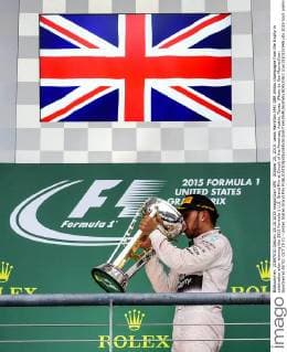 October 25, 2015: Lewis Hamilton (44) GBR drinks champagne from the trophy in celebration after winning the 2015 Formula 1 U.S. Grand Prix at Circuit of the Americas, Austin, Texas. (Photo by Ken Murray Icon Sportswire) AUTO: OCT 25 F1 - United States Grand Prix Icon1510252945 EDITORIAL USE ONLY