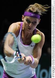 (151026) -- SINGAPORE, Oct. 26, 2015 -- Lucie Safarova of the Czech Republic returns the ball during the WTA Tennis Damen Finals round robin match against Garbine Muguruza of Spain at Singapore Indoor Stadium in Singapore, Oct. 26, 2015. Lucie Safarova lost 0-2. )(wll) (SP)SINGAPORE-TENNIS-WTA FINALS ThenxChihxWey 