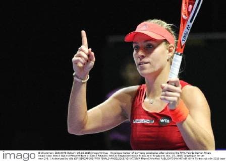 Angelique Kerber of Germany celebrates after winning the WTA Tennis Damen Finals round robin match against Petra Kvitova of Czech Republic held at Singapore Indoor Stadium in Singapore, Oct. 26, 2015. Angelique Kerber won 2-0. ) Authorized by ytfs (SP)SINGAPORE-WTA FINALS-ANGELIQUE VS KVITOVA ThenxChihxWey 