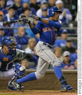 New York Mets Curtis Grandson hits a solo home run against the Kansas City Royals during the fifth inning of game 1 of the World Series at Kauffman Stadium in Kansas City, Missouri on October 27, 2015. The Royals will play the New York Mets in the 2015 World.  KCP2015102722 KEVINxDIETSCH