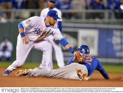 New York Mets Juan Lagares steals second base ahead of the tag from Kansas City Royals second baseman Ben Zobrist during the eighth inning of game 1 of the World Series at Kauffman Stadium in Kansas City, Missouri on October 27, 2015.  KCP2015102739 KEVINxDIETSCH
