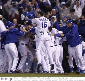 The Kansas City Royals celebrate after winning in the14th inning of game 1 of the World Series against the New York Mets at Kauffman Stadium in Kansas City, Missouri on October 27, 2015. Royals Eric Hosmer sacrificed in Alcides Escobar to beat the Mets 5-4.  KCP20151027244 JEFFxMOFFETT