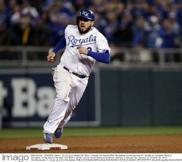 Kansas City Royals Mike Moustakas rounds second on a double by Salvador Perez in the eighth inning against the New York Mets in game 2 of the World Series at Kauffman Stadium in Kansas City, Missouri on October 28, 2015. The Royals won 7-1 to go up 2-0 in the Series.  KCP20151028267 JEFFxMOFFETT
